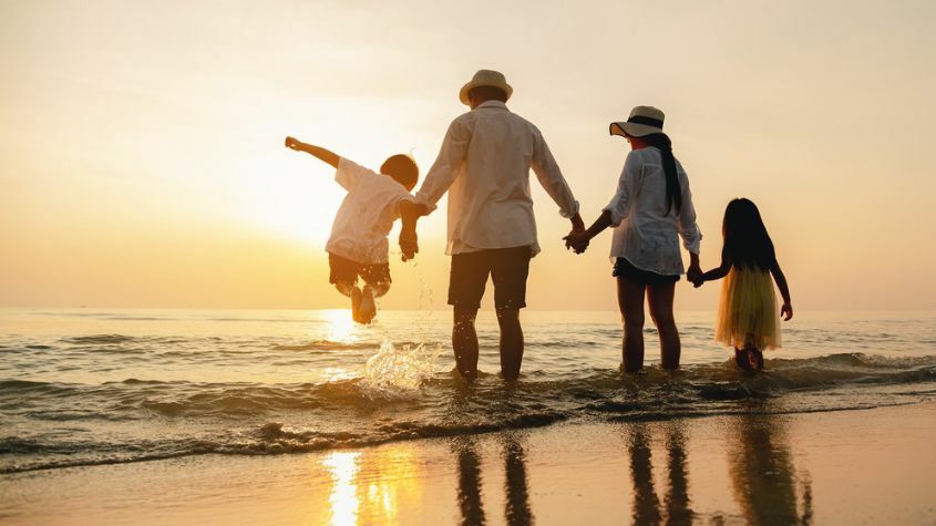 Família Turistas a Praia